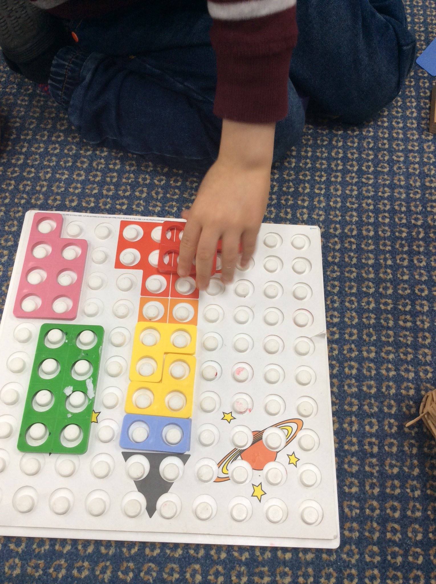 Picture of child using numicon