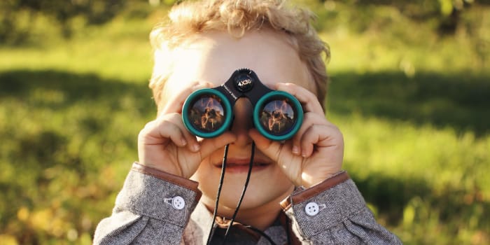 Child with binoculars 