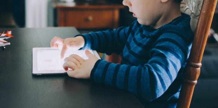 child using iPad